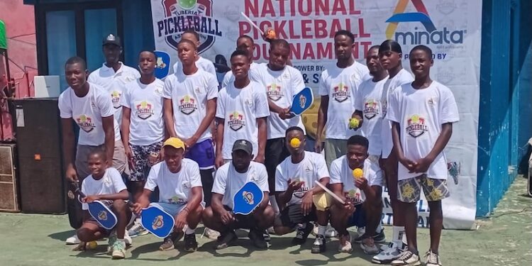 Group photo of Liberian pickleball players at Invincible Sports Park during the first national pickleball tournament in Monrovia, Liberia.