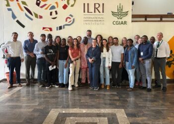 Group of international journalists and CGIAR scientists at ILRI campus in Nairobi during a field and laboratory tour on agricultural research and innovation