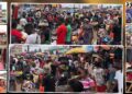 Crowded Christmas market in Monrovia with traders waiting for buyers amid slow sales