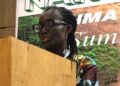 ActionAid Liberia Country Director Elizabeth Gbah Johnson delivering remarks at the National People’s Climate Justice Summit in Monrovia