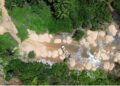 Drone image showing illegal sand mining operations at Gbengbar Town beach in Liberia.