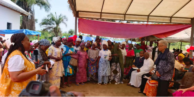 Leymah Gbowee and community members attend the dedication of the new Sisters Place Girls’ Empowerment Center dormitory in Melekie Town, Bong County