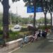 Urban street in Guangzhou, China, with bicycles, trees and pedestrian spaces — captured by B. Garmondyu Zogar (2025).