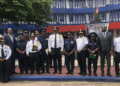 Liberia and Sierra Leone police delegations pose at LNP Headquarters during a bilateral security cooperation meeting in Monrovia.
