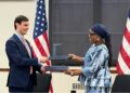 Liberia’s Foreign Minister Sara Beysolow Nyanti and U.S. Under Secretary Jeremy Lewin exchange signed documents during the US$124M health cooperation agreement ceremony in Washington, D.C