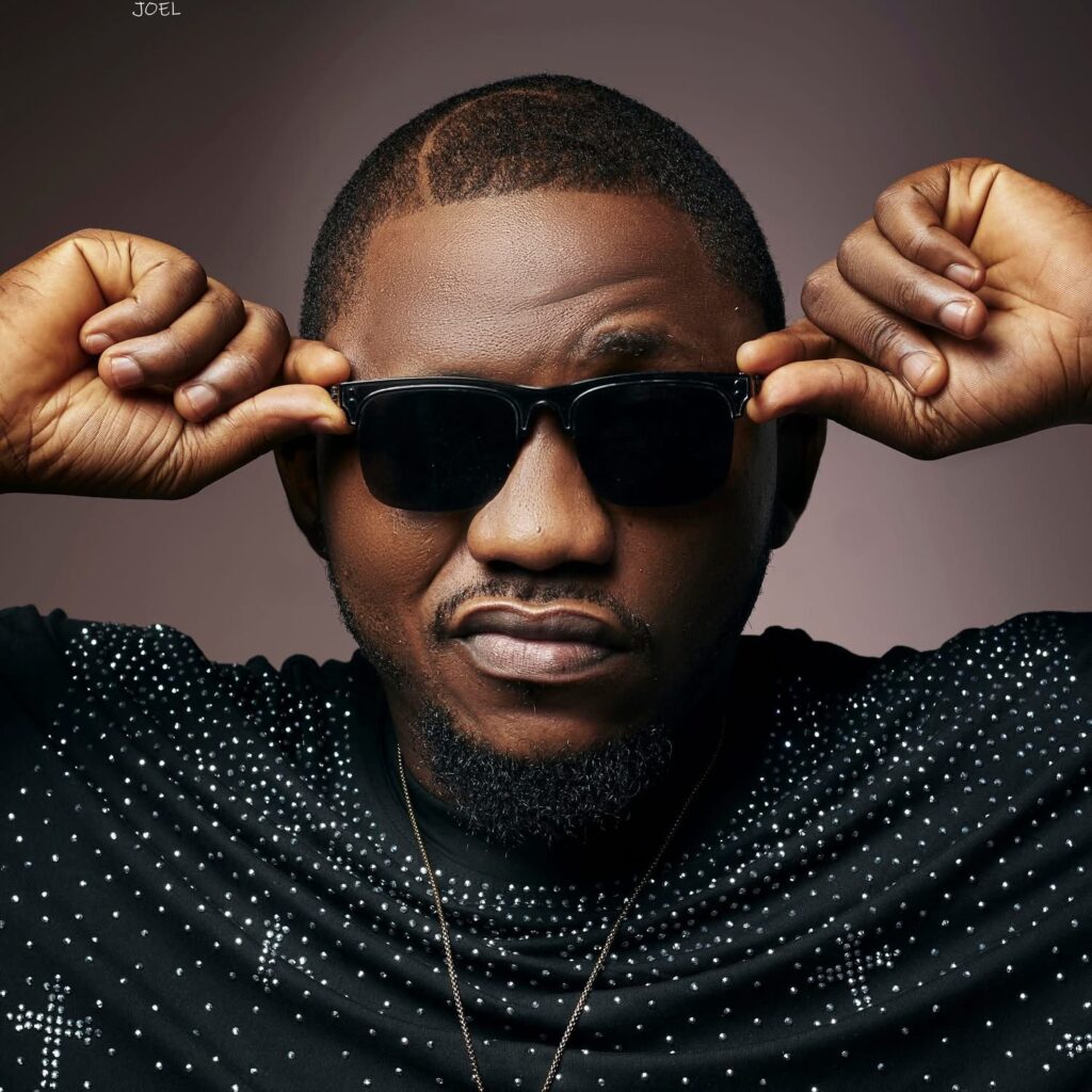 Liberian artist Mr. Church wearing sunglasses and posing confidently as he promotes his new single ‘La Geez.