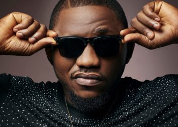 Liberian artist Mr. Church wearing sunglasses and posing confidently as he promotes his new single ‘La Geez.