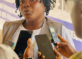 Musu W. Davis of IWYE speaks during an interview, calling for increased family planning funding in Liberia.