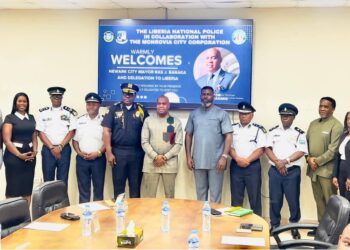 Newark Mayor Ras Baraka and Monrovia officials pose with Liberia National Police leadership during partnership visit in Monrovia