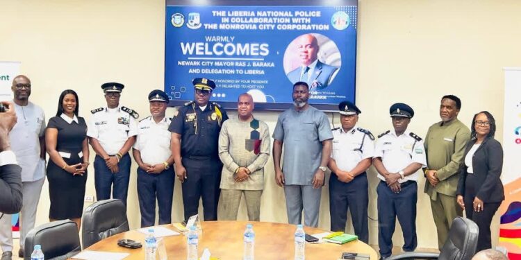 Newark Mayor Ras Baraka and Monrovia officials pose with Liberia National Police leadership during partnership visit in Monrovia