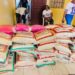 Mr. Sio and Rep. Seboe distribute rice to residents
