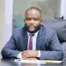 NPA Managing Director Sekou A.M. Dukuly seated at his desk during an official meeting.