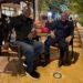 Jake Kabakole of Vision Basketball Liberia and Opeyemi Babalola of Webber Hoops & Courts seated outdoors during a pre-signing meeting in Monrovia