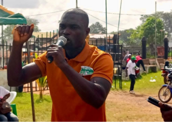 Fedrick Gunor Howard speaking passionately during a Unity Party fundraising rally in Zwedru, confronting VP Koung over grassroots neglect