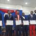 UL 105th Graduating Class leadership inductees holding certificates during inauguration ceremony in Monrovia.