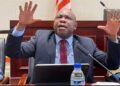Former Finance Minister Samuel Tweah gestures during a court-related proceeding amid Supreme Court ruling rejecting immunity claims