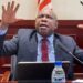 Former Finance Minister Samuel Tweah gestures during a court-related proceeding amid Supreme Court ruling rejecting immunity claims