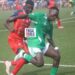 Players from competing counties battle for possession during a National County Sports Meet group-stage match in Liberia
