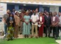 Officials and business leaders pose at the launch of Golden Touch Corporation’s Compliance Services Center in Monrovia.
