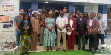 Officials and business leaders pose at the launch of Golden Touch Corporation’s Compliance Services Center in Monrovia.