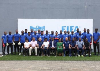 Group photo of 22 Liberian goalkeeper coaches and FIFA instructors at the LFA headquarters during the Elite Youth Goalkeeper Workshop.