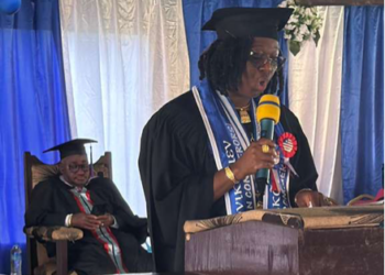 Rev. Mrs. Dialokai Golanyon-Kemayah delivers her valedictory address after graduating with a record GPA at Liberia Baptist Theological Seminary.