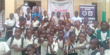 Students and staff of Maretha International Preparatory School pose during the launch of Intellectual Property Day aimed at promoting awareness of intellectual property rights
