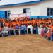 A large group of rural women and officials gather in Todee District during the LWEP engagement event led by Gender Minister Gbemie Horace Kollie