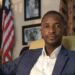 Dr. Clarence Moniba seated in his office, calling on the Legislature to redirect $4.6M from its budget to science laboratory construction across Liberia