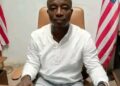 Dominic Nimely, Chairman of PATEL, speaks at his Monrovia office during a press conference warning that misinformation is harming Liberian businesses