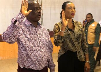 Kimberly Toure and James D. Smith being sworn in during the ALCC General Assembly in Paynesville
