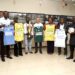 APM Terminals Liberia leaders and Youth and Sports officials pose with County Meet jerseys, trophies, and footballs during the 2025/2026 sponsorship handover ceremony.