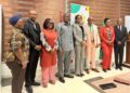 A delegation of NEC-Liberia, lawmakers, Law Reform Commission, and UNDP officials pose for a group photo after returning from a study tour on electoral reforms in Ghana