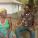 TLI reporter Rancy Clarke interviewing a woman in Sawolor Town for the story that won him the 2025 Young Journalist of the Year Award.