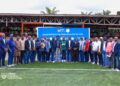 Liberia Football Association officials, local leaders, and partners pose during the inauguration ceremony of the new artificial football pitch in Sanniquellie, Nimba County.