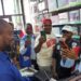 CSA Director-General Dr. Josiah F. Joekai Jr. demonstrating the new digital LPA biometric platform during a live transaction in Monrovia.