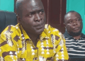 EPA Executive Director Dr. Emmanuel Urey Yarkpawolo presenting environmental and climate progress report in Monrovia