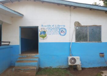 Exterior of Karnplay Comprehensive Health Center in Nimba County, where counseling followed an HIV status disclosure dispute