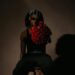 Liberian R&B and Afro-soul artist Jadeo holding red roses during a studio photoshoot for his single Bad Way.