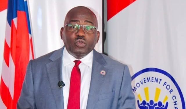 CMC leader Musa H. Bility speaks at a podium as he promotes proposed legislation to help African-Americans make Liberia a second home.