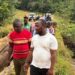 Members of the Polunaken Movement visit the Tienpo Bridge site as fundraising efforts continue to support completion of the long-delayed project.