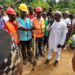Community members and construction workers gather in Mannah Clan, Bomi County, as Alexander Jackson launches the US$15,000 Robertson Bridge project in Klay District.