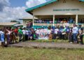 Health workers and partners pose at Rivercess District Referral Hospital during a health program highlighting new investments in River Cess County.