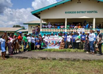 Health workers and partners pose at Rivercess District Referral Hospital during a health program highlighting new investments in River Cess County.