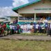 Health workers and partners pose at Rivercess District Referral Hospital during a health program highlighting new investments in River Cess County.