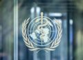 World Health Organization logo displayed at WHO headquarters as the agency responds to the United Statesβ formal withdrawal.