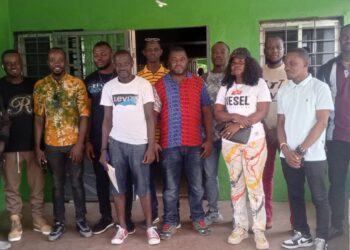 Participants pose during a Liberia Forest Media Watch forum in Monrovia focused on forest accountability and enforcement against illegal activities.