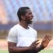 Kelvin Sebwe gestures during a match as LISCR FC appoints him interim head coach for the remainder of the 2025–26 season.