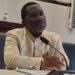 Labour Minister Cllr. Cooper Kruah during a public hearing as LILGA’s 2025 labour report exposes worker exploitation in Liberia