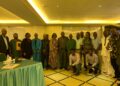 Group photo of LACRA officials, government representatives and stakeholders at oil palm regulation validation meeting in Monrovia